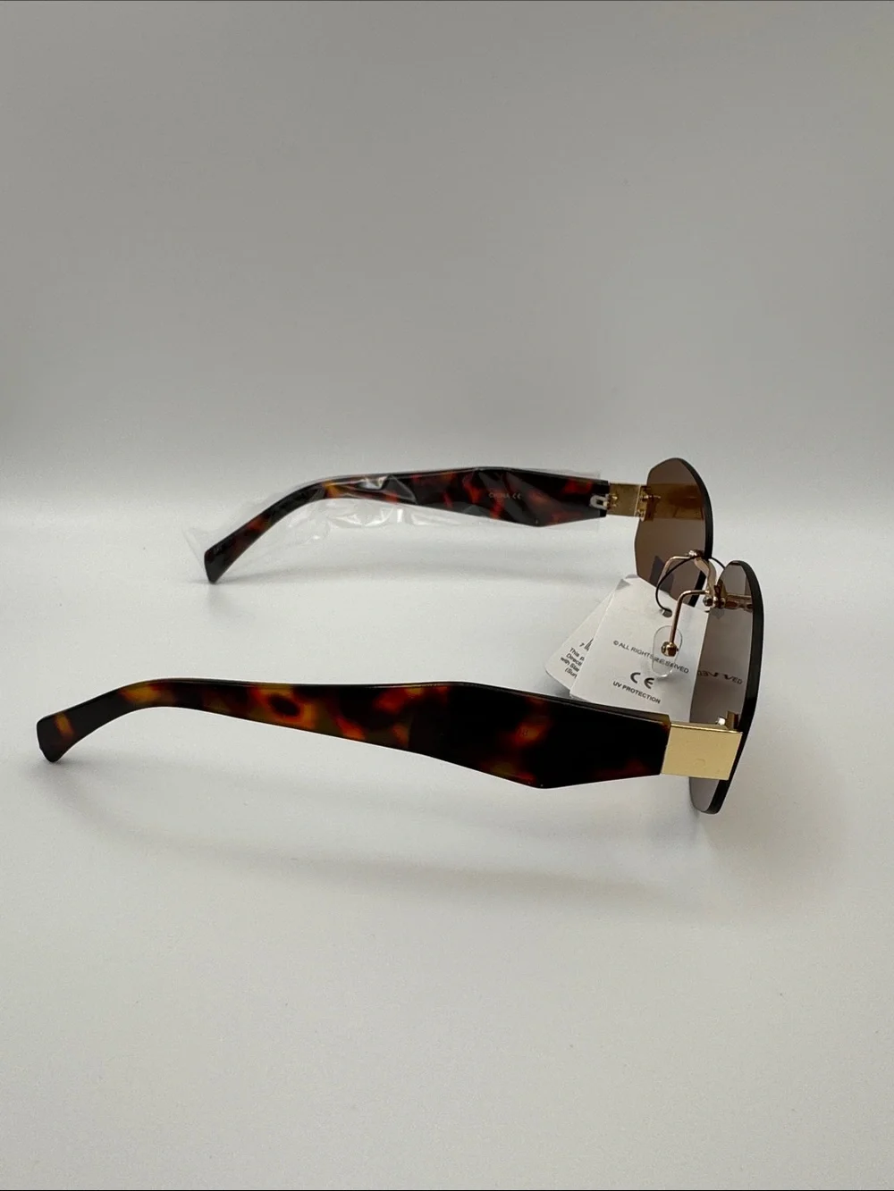 Brown Rimless Women's Sunglasses - Unbranded